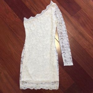 White lace body con dress with one sleeve